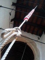 Bell rope hanging from belfry